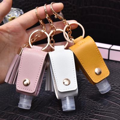 China Custom Leather Key Chain Holder Hand Sanitizer Hand Sanitizer Holder Wholesale Car Key Chains PU Car Key Chain Holder White With Tassel for sale