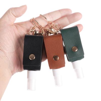 China Wholesale Car Key Holder Car Key Chain Custom PU Leather Key Chains 30ml Hand Sanitizer Holder Key Chain Blank With Tassel for sale