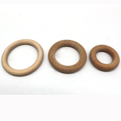 China New BPA Safe Wholesale Food Grade Soft Organic Soft Custom Wooden Teether Ring Baby Teething Wooden Teether Ring for sale