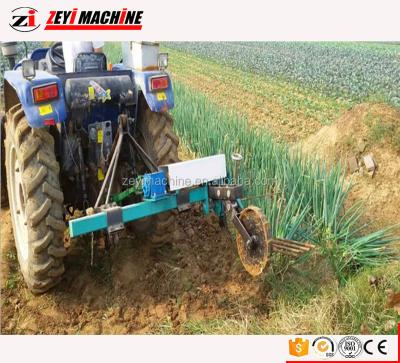 China New spring onion harvester 218 style white onion green onion digger harvest making machine for sale