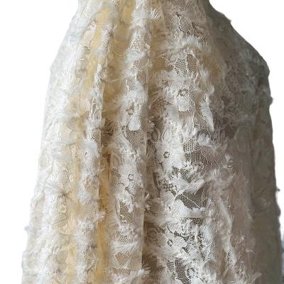 China PD1016 water soluble 3d flower lace tassels lace embroidery dress fabric ivory color mesh stretch sequin fabricslotteslottes for sale