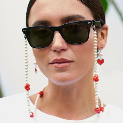 China Luster Acrylic Pearl Glasses Hanging Small Serving Chain Fashion Exquisite Cute Red Ladies Heart Style Jewelry for sale