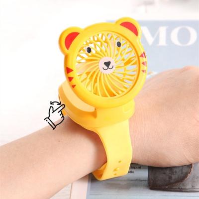 China Mini single wrist fan 2022 portable foldable wearble cartoon led summer kids mini wrist watch fan for sale