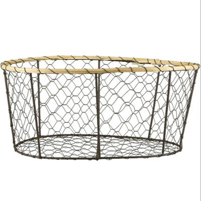 China Sustainable Iron wire woven storage egg kitchen vegetable fruit bread storage basket snack sundry vegetable basket for sale