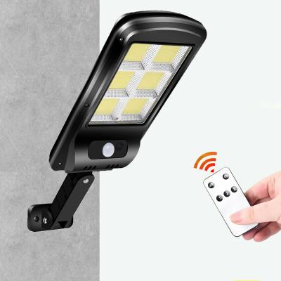 China Waterproof Solar Powered Garden COB LED Motion Sensor Wall Lights Solar Garden Lamp Security Lights Street Light for sale