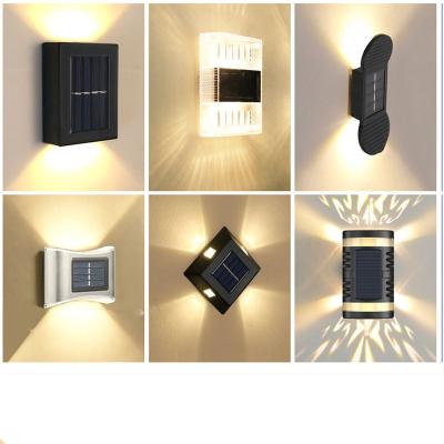 China Outdoor Solar Powered Garden Glow Wall Light Fence Lights Modern Lamp Motion Sensor Waterproof Solar Garden Security Lighting for sale