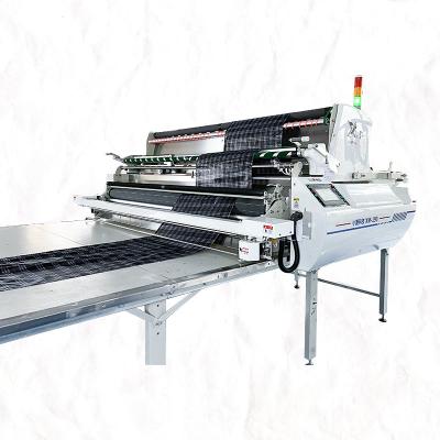 China Garment Shops XIAOMAI Smooth Safe And Safe Cloth Relaxing Servo Motor Cloth Cloth Spreading Machine for sale