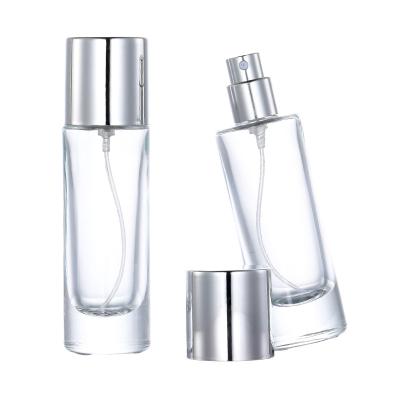 China High Qiality Nbyaic B011-30ml Silver Cover Clear Straight Round Glass Perfume Bottle Bottled Portable Spray Empty Bottle for sale