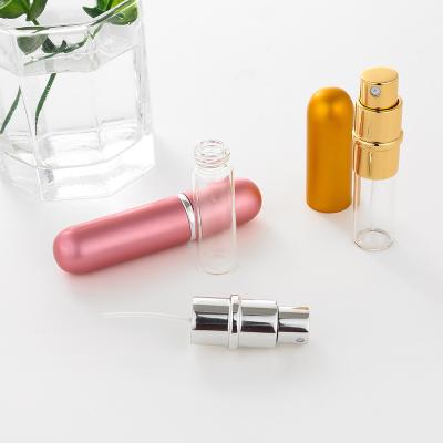 China High Qiality Nbyaic J002-5ML Wholesale Round Head Metal Shell Perfume Bottle Mini Empty Spray Bottle for sale