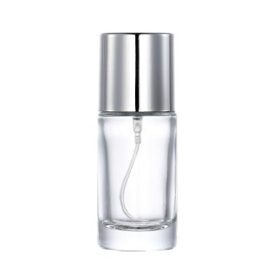 China High Qiality Simple Design Glass Barrel Perfume Upright Portable Spray Bottle Empty Bottle With Silver Cover for sale