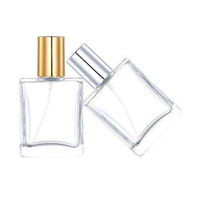 China High Qiality Simple Style Perfume Bottle Transparent Square Glass Empty Spray Bottle With Gold And Silver Cap for sale