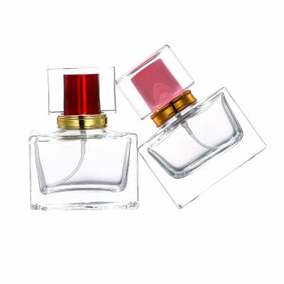 China High Qiality Nbyaic B055-30ML Hot Selling Rectangular Transparent Perfume Bottle With Color Cap Small Spray Bottle for sale