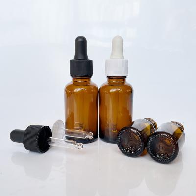 China Cosmetic ready to ship 10ml 15ml 20ml 30ml Amber Brown Essential Oil Empty Amber Glass Dropper Bottle for sale