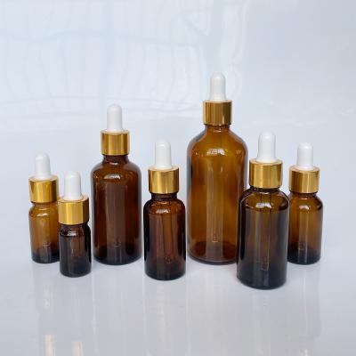 China Wholesale Amber Color 10ml 15ml 20ml 30ml 50ml 100ml Cosmetic Dropper Glass For Essential Oil Bottle for sale