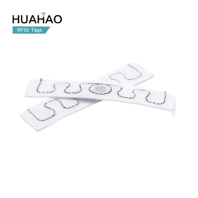 China Raincoat/Waterproof Free Sample! HUAHAO RFID Manufacturer OEM Washable NFC Apparel Tag UHF RFID Cloth RFID Tag Waterproof Custom Tag For Clothing for sale