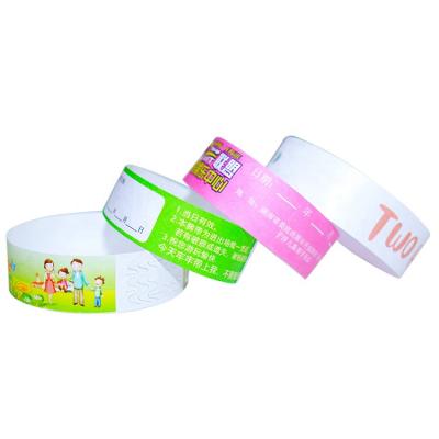 China Disposable Sliding Printable Paper Wristbands Ticket Wristbands Waterproof/Water Proof ID Slip For Events With High Performance for sale