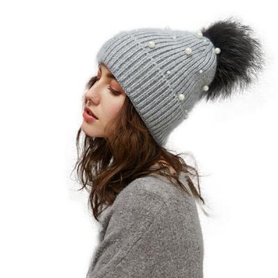 China BSC0070 2020 fashion COMMON design custom plain knitted color striped pom pom beanie hats for sale