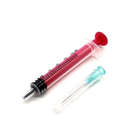 China Medical 2.5ml Color Low Dead Space Syringe With Needle And Cap for sale