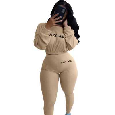 China QUICK DRY Letter Embroidery Two Piece Set Ribbed Sporty Gaiters Tracksuits Woman Custom Sweatsuits With Logo for sale