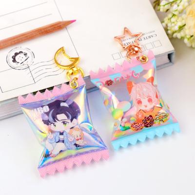 China Low MOQ Advertising Anime Candy Key Chain Inflatable Printing Acrylic Candy Shaker Charm With Colorful Glitter for sale