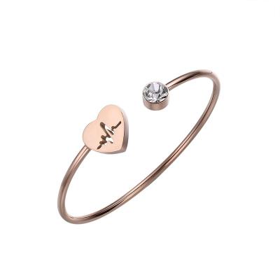 China Fashionable High Quality Hollow Heartbeat Silver Diamond Stainless Steel Slim Open Cuff Bracelet For Women for sale