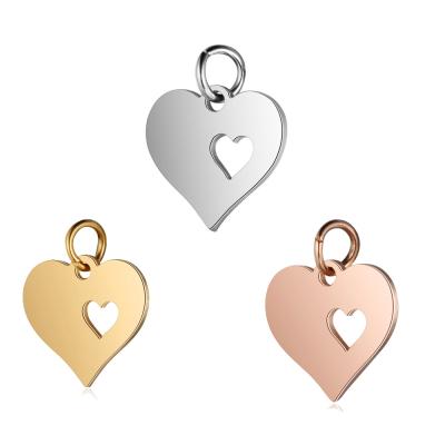 China Custom Stainless Steel Heart Shape Pendant Hollow Out Love Heart Charm Pendants For Jewelry Making for sale