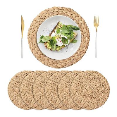 China Factory Stocked Hot Tour Shape Natural Water Hyacinth Material Woven Table Decor Place Mats for sale