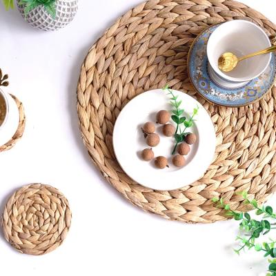 China Handmade Kitchen Rattan Coaster Set Place Mat Sea Grass Round Sustainable for sale