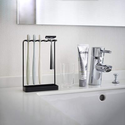 China New Design Durable Metal Iron Black Countertop Toothbrush Holder Durable For Hanging Toothbrush Holder for sale