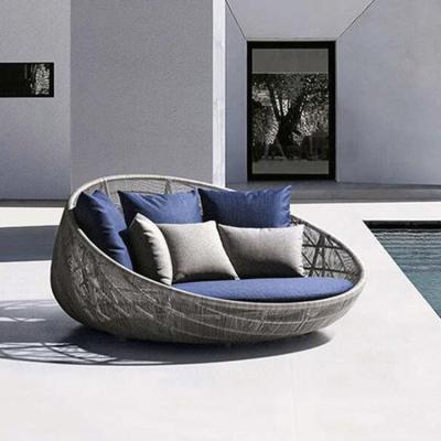 China Modern waterproof wicker sofa beach daybed swimming pool sun bed round patio rattan bed for sale