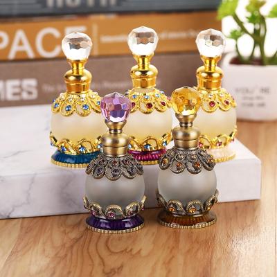 China European Personal Care 15ml Middle East Dubai Metal Alloy Patent Jewelry Stones Perfume Empty Glass Bottle Essential Oil Attar Bottle#81135S for sale