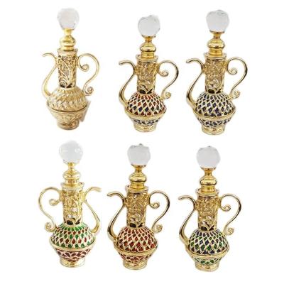 China Personal Care 4ml Gold Metal Jug Glass Perfume Bottles Refillable Attar Personal Arabic Essential Oil Attar Bottle#5613 for sale