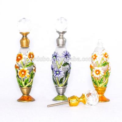 China Personal Care 6ml Metal Flower Bee Chrysalis Shape Attar Perfume Bottle Arabic Glass Essential Oil Bottles#56339/56536/56341/56513 for sale