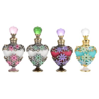 China Personal Care 10ml Zinc Alloy Metal Perfume Frosted Refillable Attar Bottle Glass Heart Shape Essential Oil Bottles Factory Outlet#81169 for sale