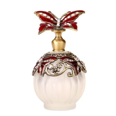 China 0il Bottle#56333 Metal Glass Perfume Bottle Essential Antique Arabic Classic Butterfly Pumpkin Bottle#56333 Refillable for sale