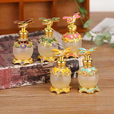 China Personal Care 15ml Metal Dragonfly Perfume Bottle Empty Glass Antique Arabian Attar Alloy Patented Essential Oil Bottles Factory Outlet#70022S for sale