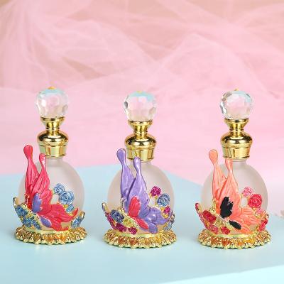 China Personal Care 15ml Middle East Dubai Patented Refillable Metal Dragonfly Perfume Bottle Glass Essential Oil Attar Bottles Factory Outlet#15106 for sale