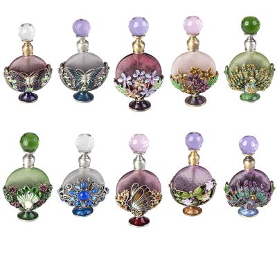 China 0il Bottle#57343 Empty Glass Personal Care 8ml Metal Butterfly Perfume Bottle Purple Essential Bottle Refillable for sale