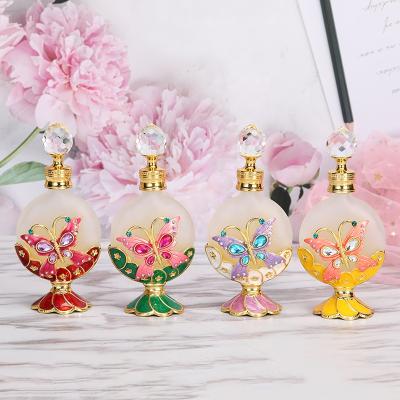 China Personal Care 15-18ml Dubai Arab Patented Butterfly Metal Perfume Bottle Essential Oil Attar Bottles Popular Refillable Factory Outlet15303 for sale