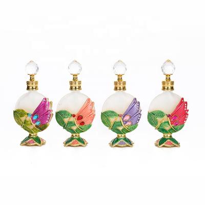 China Personal Care 15ml Arabian Dubai Patented Stones Dragonfly Metal Perfume Bottle Essential Oil Refillable Fancy Attar Bottles #15307 for sale