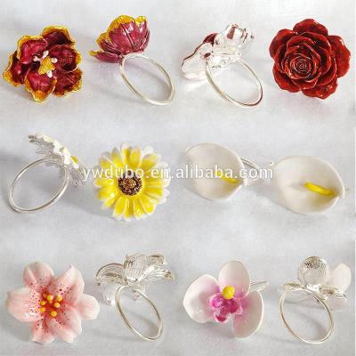 China Viable DB Patented New Napkin Ring Racks Metal Alloy Rose Flower Calla Lily Sunflower Napkins Holder for sale