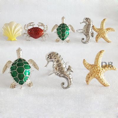 China Viable Style Copyright Patented Napkin Ring Shell Crab Tortoise Seahorse Starfish Metal Sea Animal Wedding Favor Table Centerpieces for sale