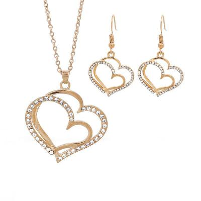 China Diamond Cutout Heart Pendant Necklace Earring Jewelry Set Romantic Dinner Wedding Jewelry Accessories For Women Girls for sale