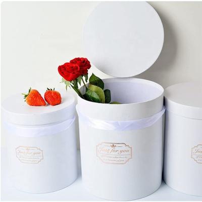 China Materials Custom Small Recycled Cute Round Box Round Cap Box / Medium Size Fresh Rose Flower For Flower With Showable Lid for sale