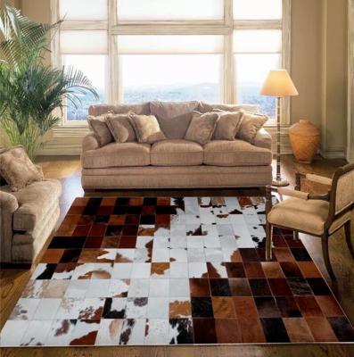 China Luxury Wholesale Non-slip Cowhide Blankets For Living Room for sale