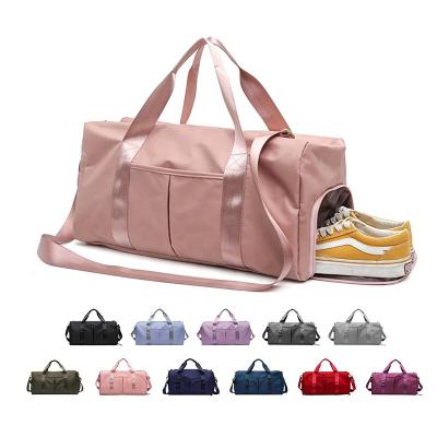 China Solid Color Outdoor Sport Customized Logo Duffel Bags Large Capacity Overnight Bag Gym Women Waterproof Sports Travel Bag for sale