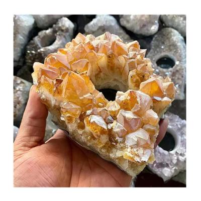 China Europe wholesale people open natural raw quartz group citrine candlestick for home decoration for sale