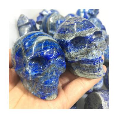 China Europe Wholesale Natural Healing Crystals Stone Hand Craved Lapis Lazuli Skulls For Sale for sale