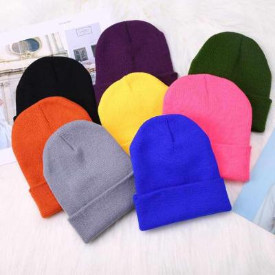 China COMMON 2021 bulk winter unisex casual floppy hats customized hat monochromatic lightweight beanie for sale