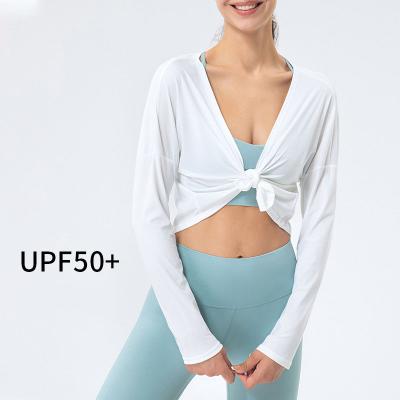 China New Style Yoga Wear Butt Breathable Tarpaulin Tie Up Skirt Long Sleeve Blouse Loose Sports Fitness Jacket Top Anti-UV Women for sale